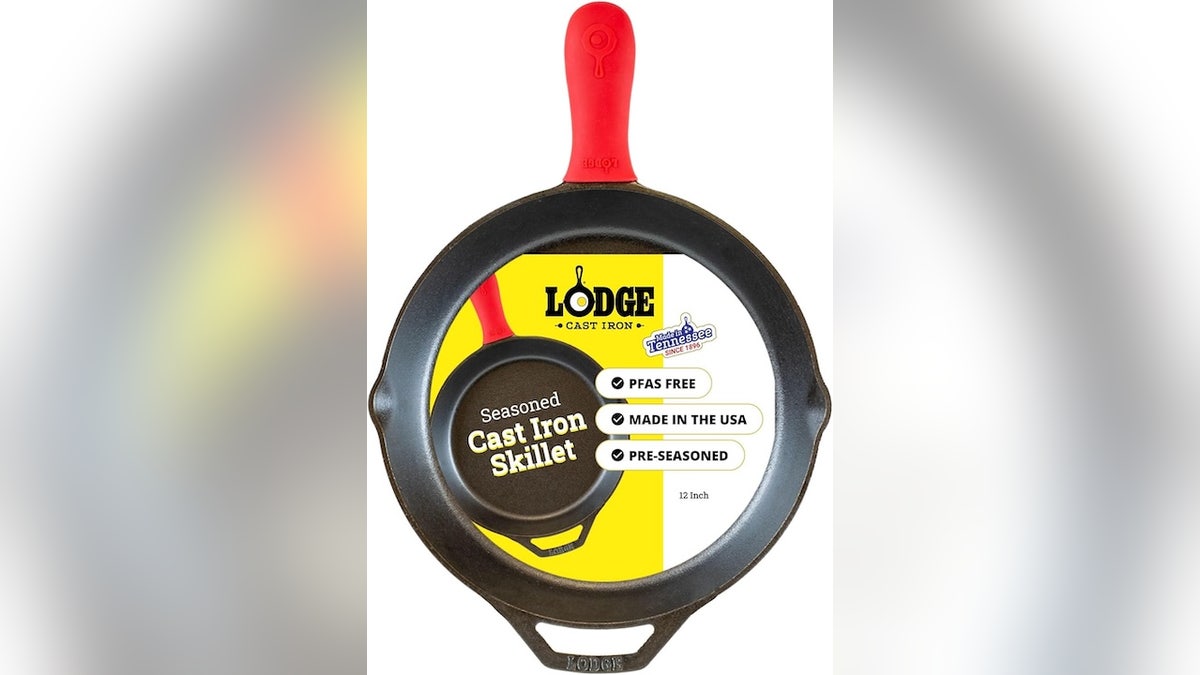 This cast iron pan has a silicone hot handle holder.