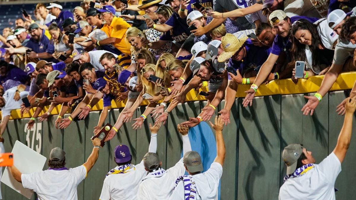 LSU Tigers fans greeting the team at Charles Schwab Field in Omaha, Nebraska