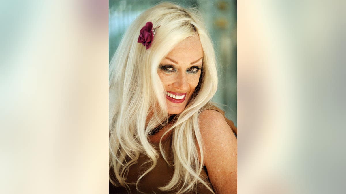 Mamie Van Doren posing in her southern California home