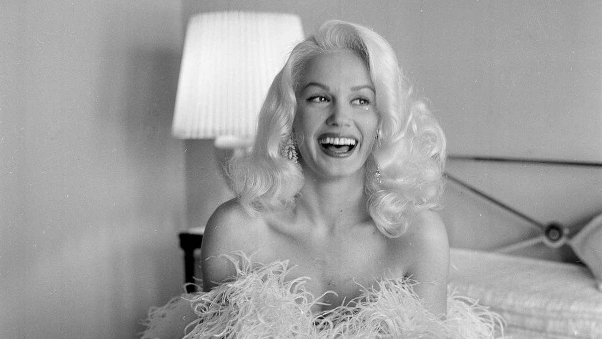 Actress Mamie Van Doren posing at home in Los Angeles
