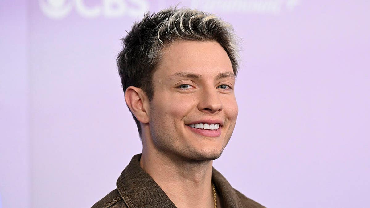 Matt Rife standing on stage at the American Music Awards in Las Vegas