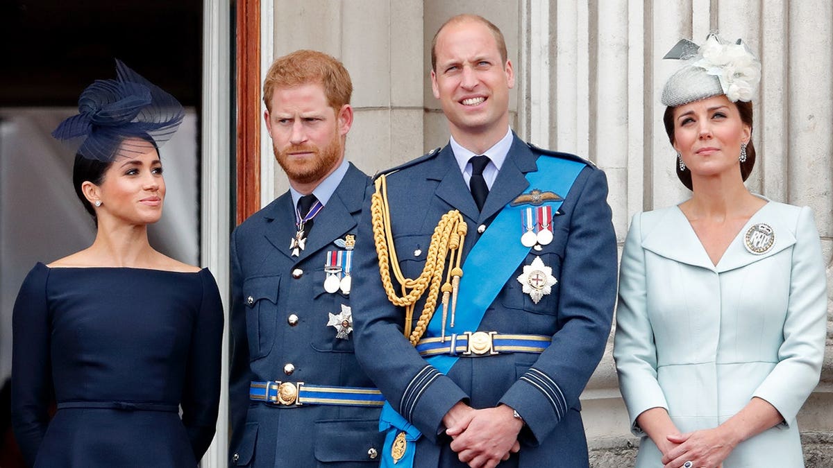 Meghan Duchess of Sussex, Prince Harry, Prince William, and Catherine Duchess of Cambridge watching flypast from Buckingham Palace balcony