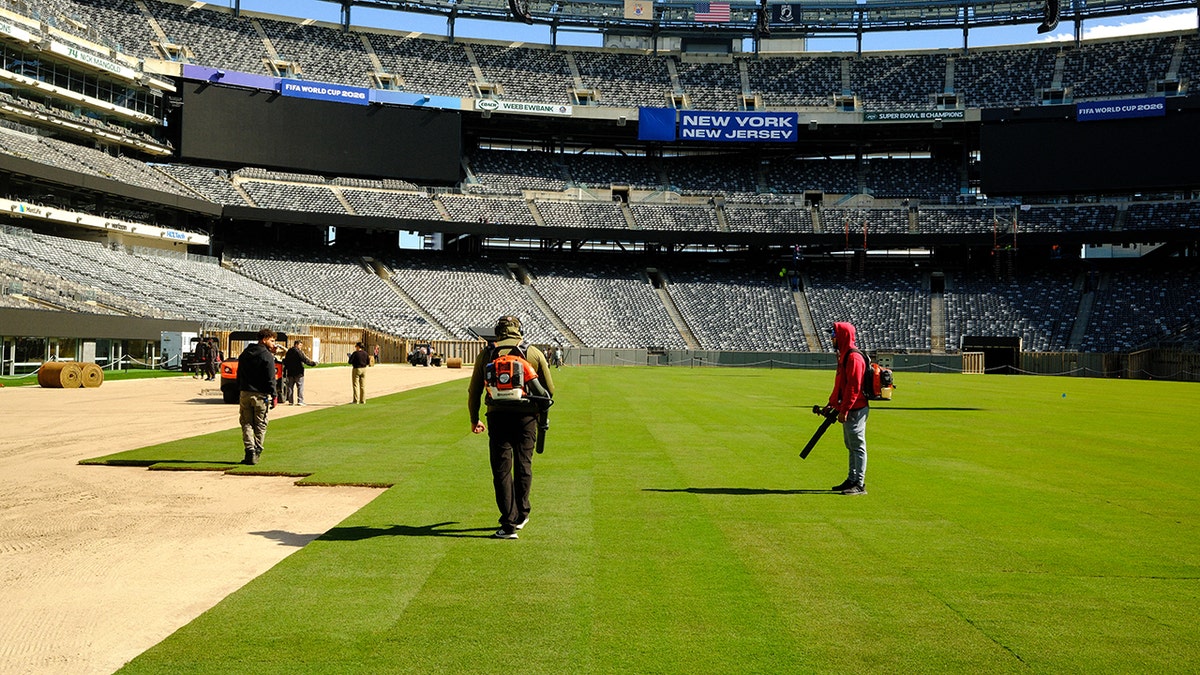 Workers installing nan transportation astatine MetLife Stadium successful East Rutherford, New Jersey