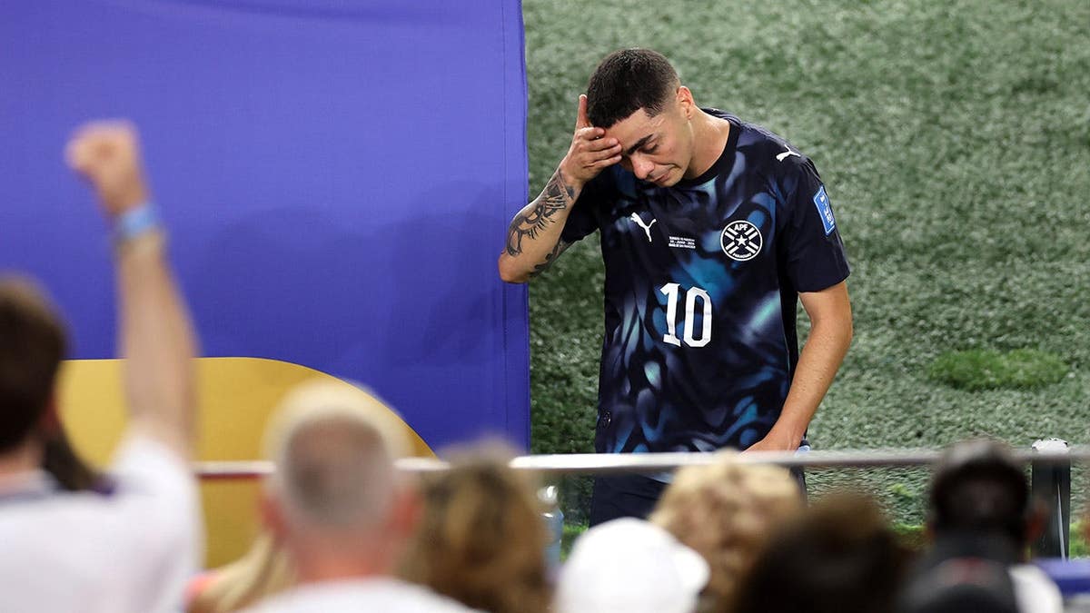Miguel Almiron reacts after receiving a red card during a FIFA World Cup match in Santa Clara, California.