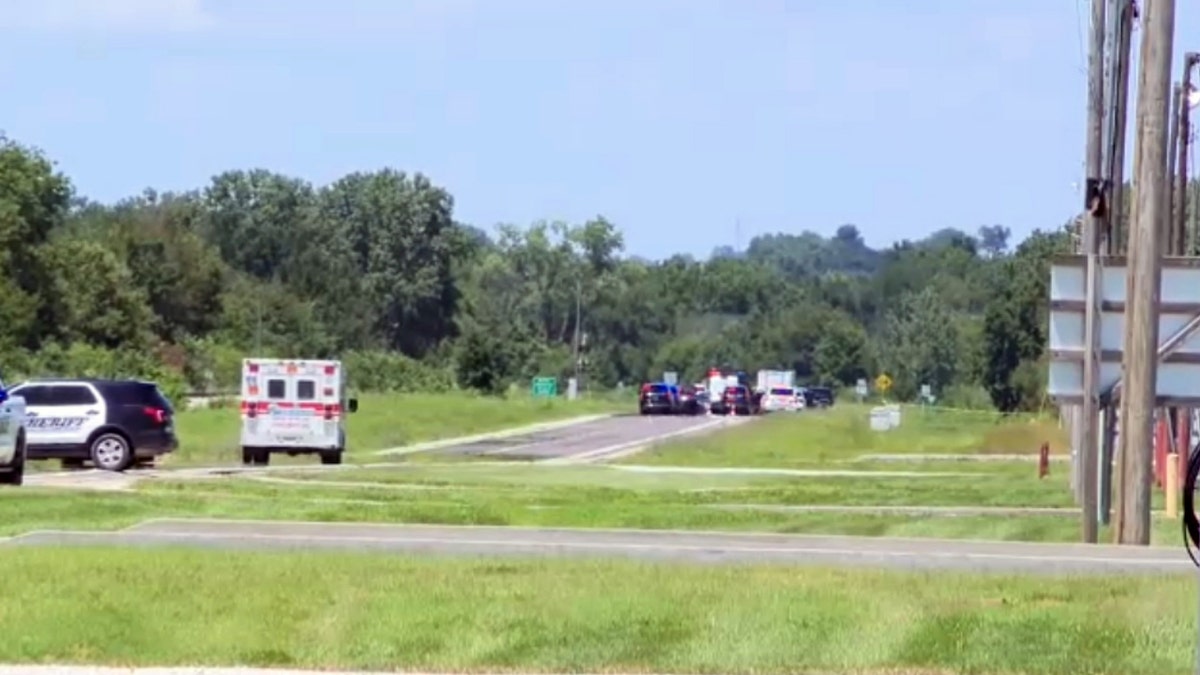Emergency vehicles block rural highway