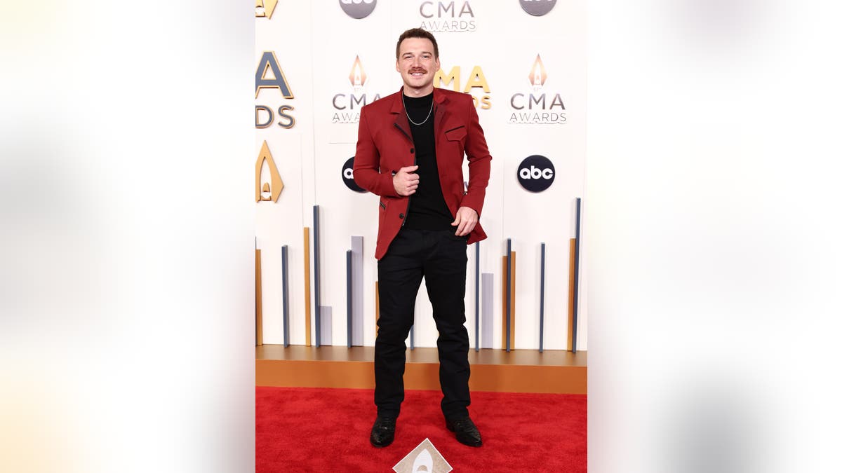 Morgan Wallen standing on stage at the 57th Annual CMA Awards in Nashville, Tennessee