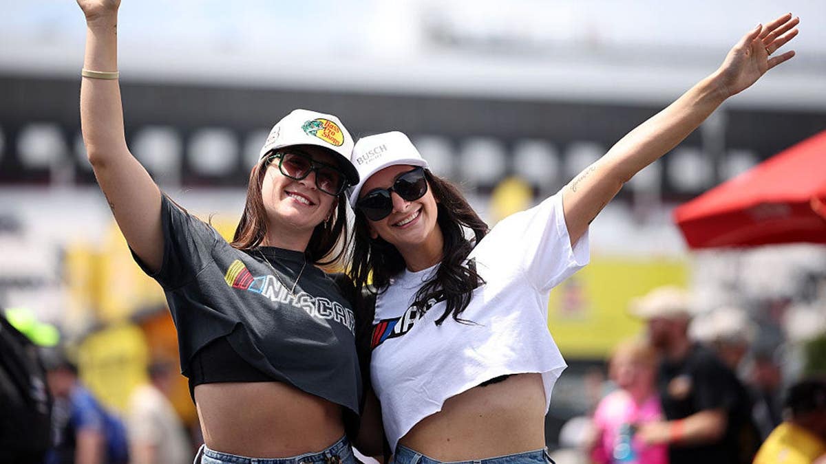 NASCAR fans ask for photos at Pocono Raceway in Long Pond, Pennsylvania