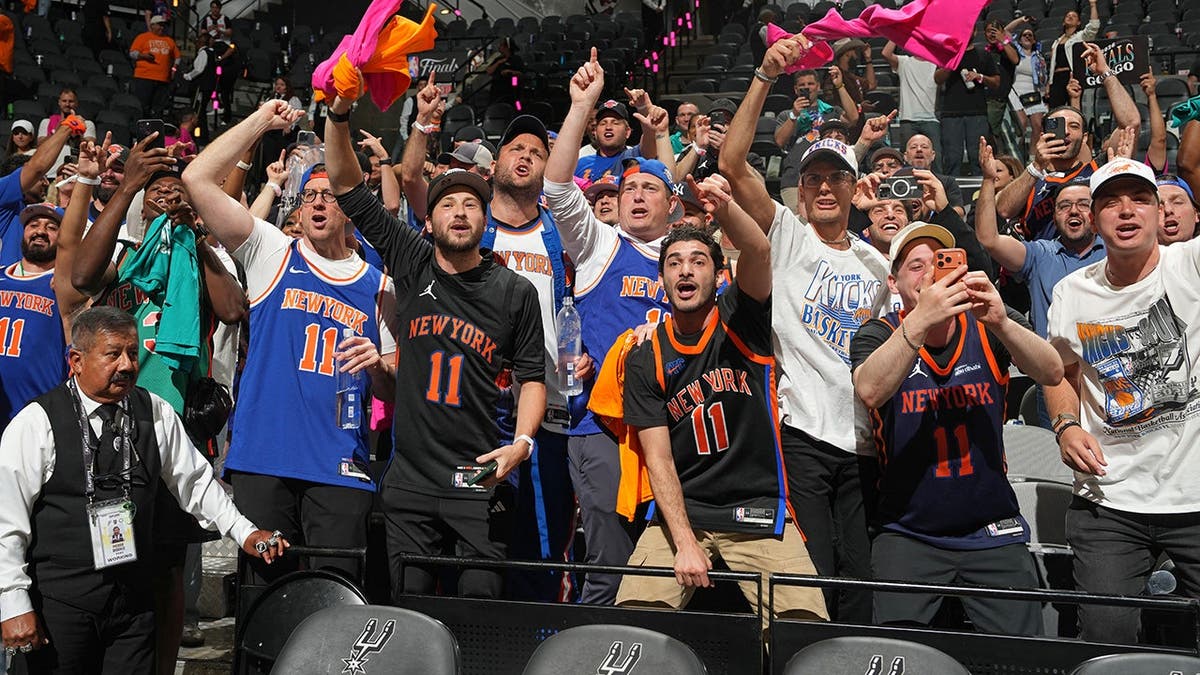 New York Knicks fans reacting during Game One of the 2026 NBA Finals at Frost Bank Center in San Antonio
