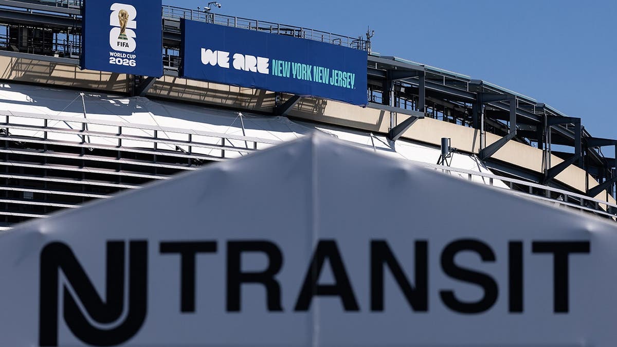 New Jersey Transit branding displayed in front of MetLife Stadium in East Rutherford