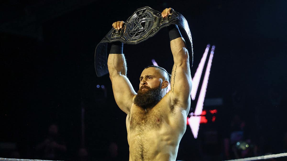 NXT Champion Tony D'Angelo looking on in ring at WWE Performance Center in Orlando, Florida