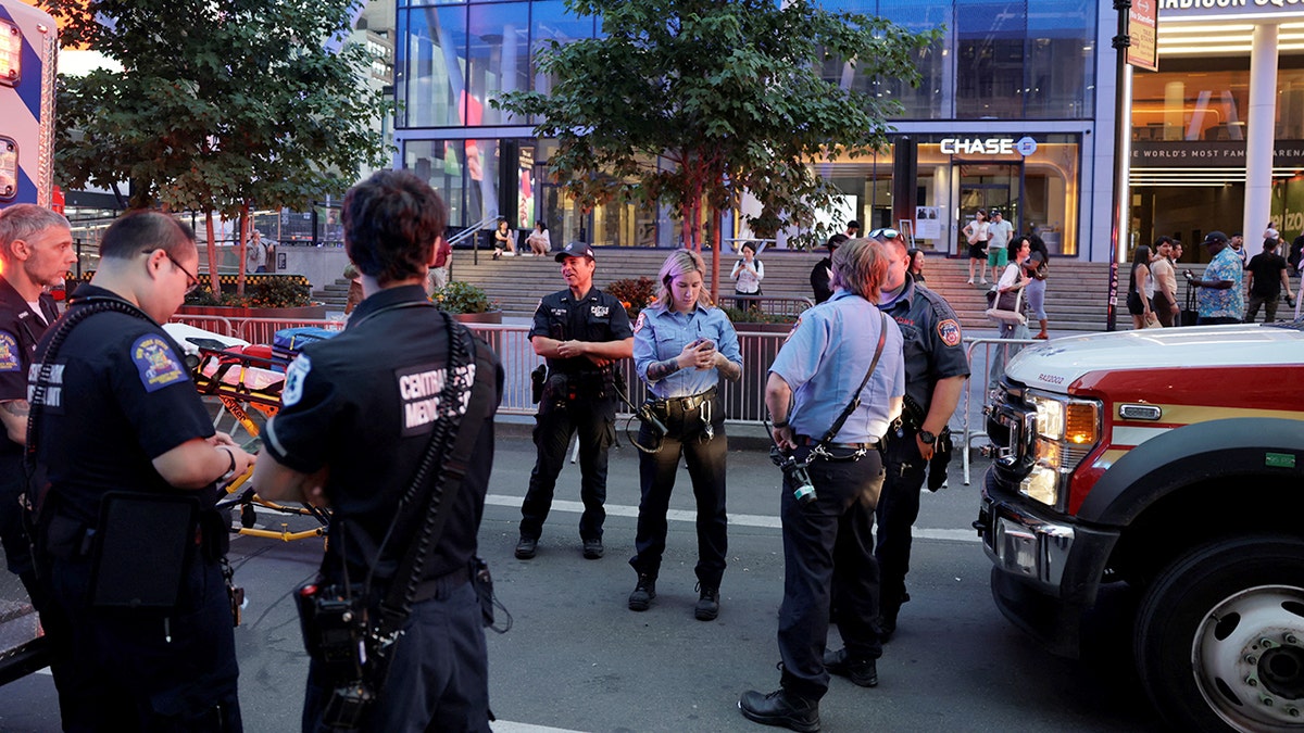 First responders gather outside Penn Station in New York City after a stabbing incident.