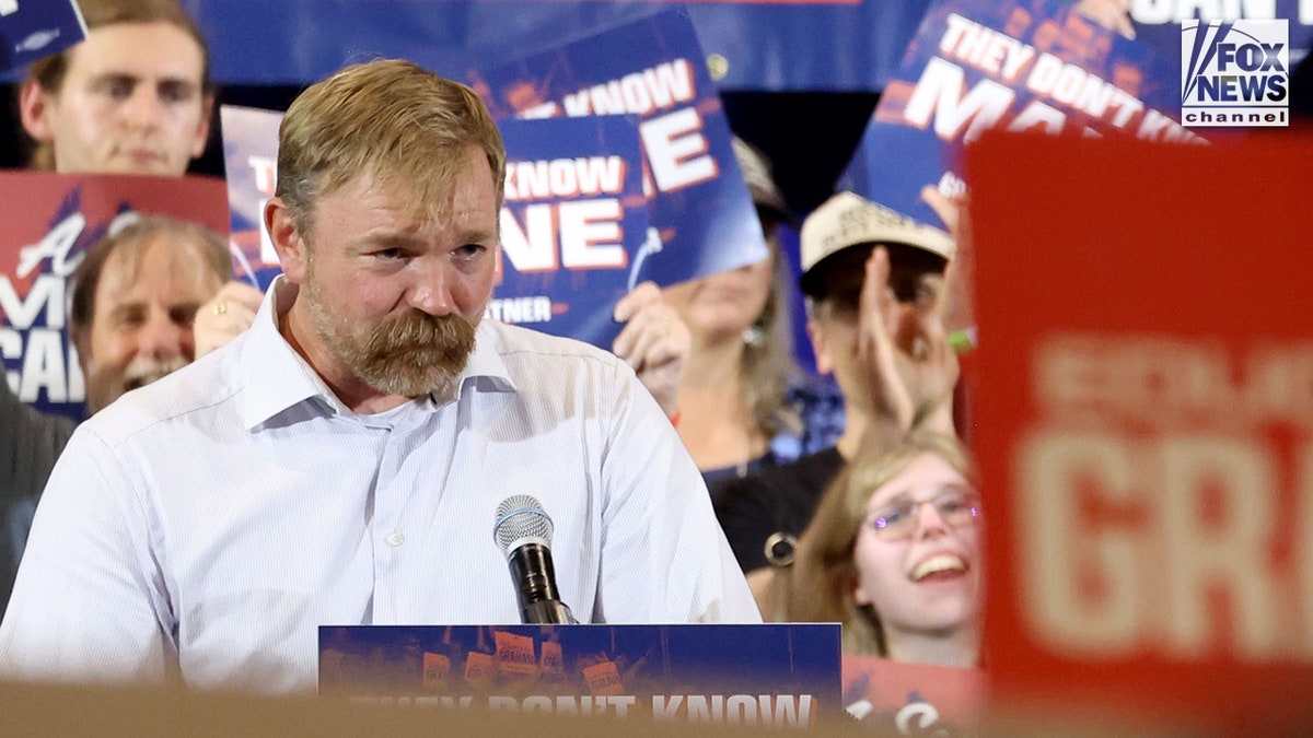Graham Platner speaks at an election watch party after wining the Senate Democratic nomination.