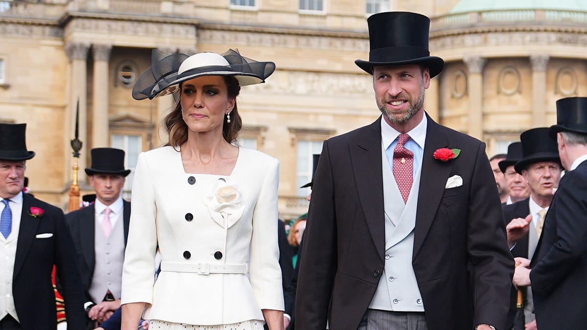 Catherine Princess of Wales and Prince William standing together at Buckingham Palace garden party
