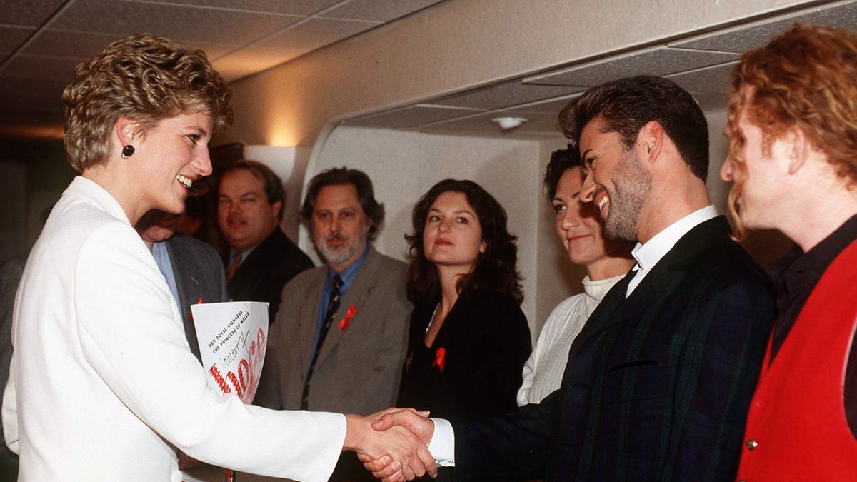 Princess Diana meeting pop singers George Michael, Kd Lang, and Mick Hucknall at Wembley Arena.