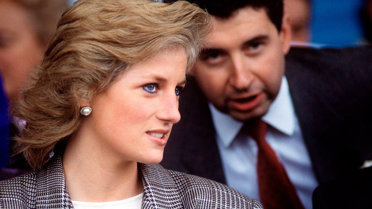 Princess Diana standing with her private secretary Patrick Jephson at the Burghley Horse Trials