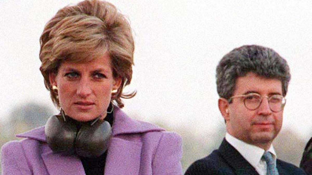 Princess Diana talking to an officer at RAF Wittering with Patrick Jephson nearby