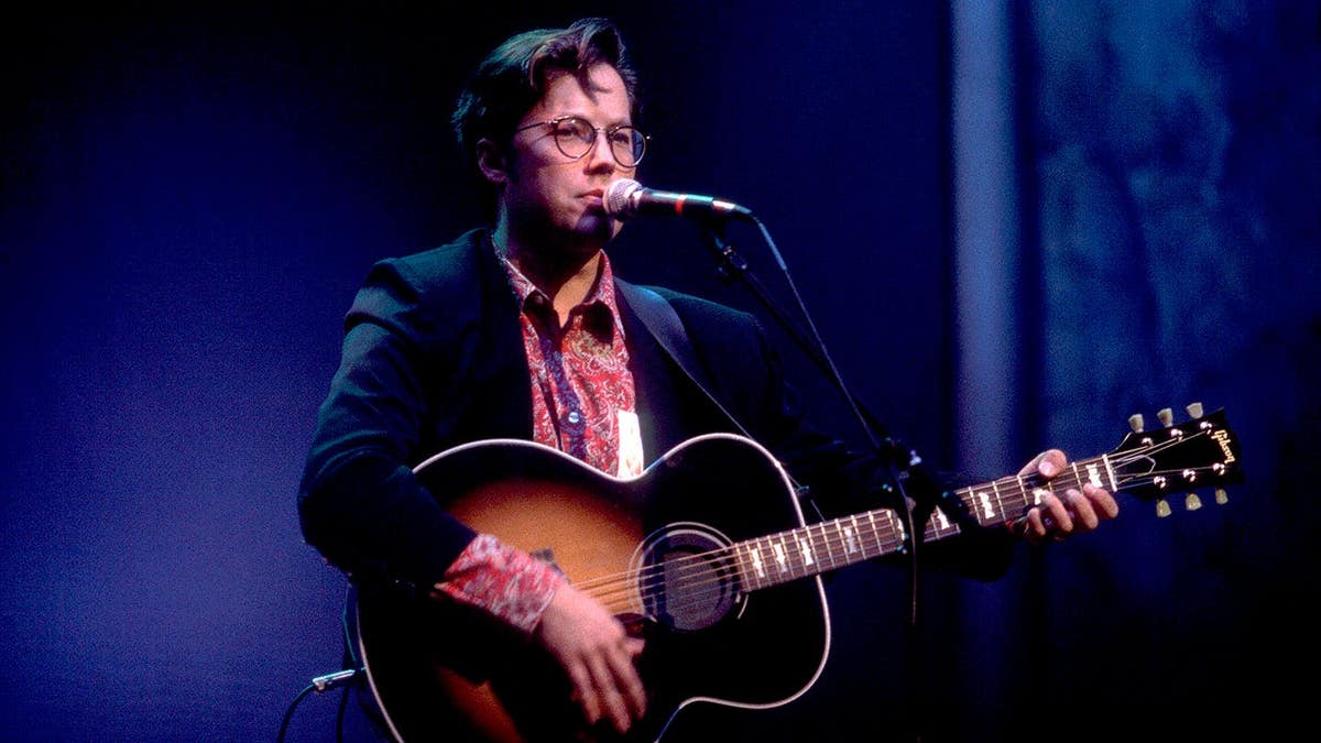 Radney Foster performing onstage at the Grand Ole Opry in Nashville, Tennessee.