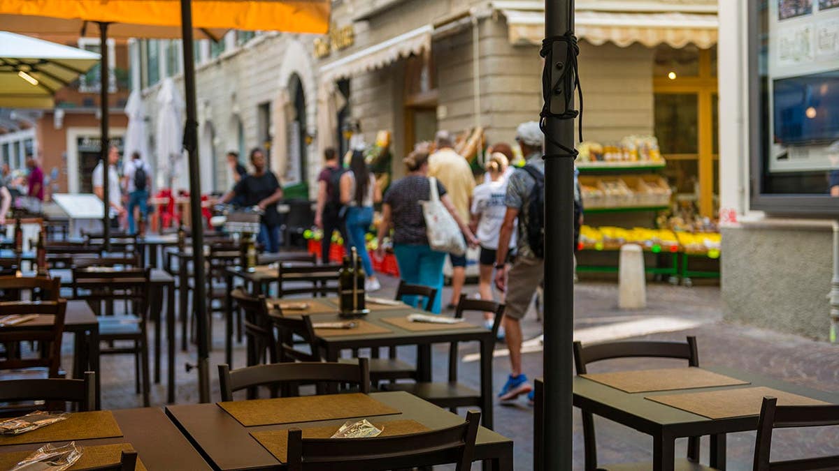 Empty table in a restaurant at old town of Riva del Garda Italy