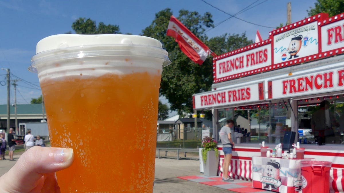 Orange soiled soda cupful connected a array astatine the Ross County Fair