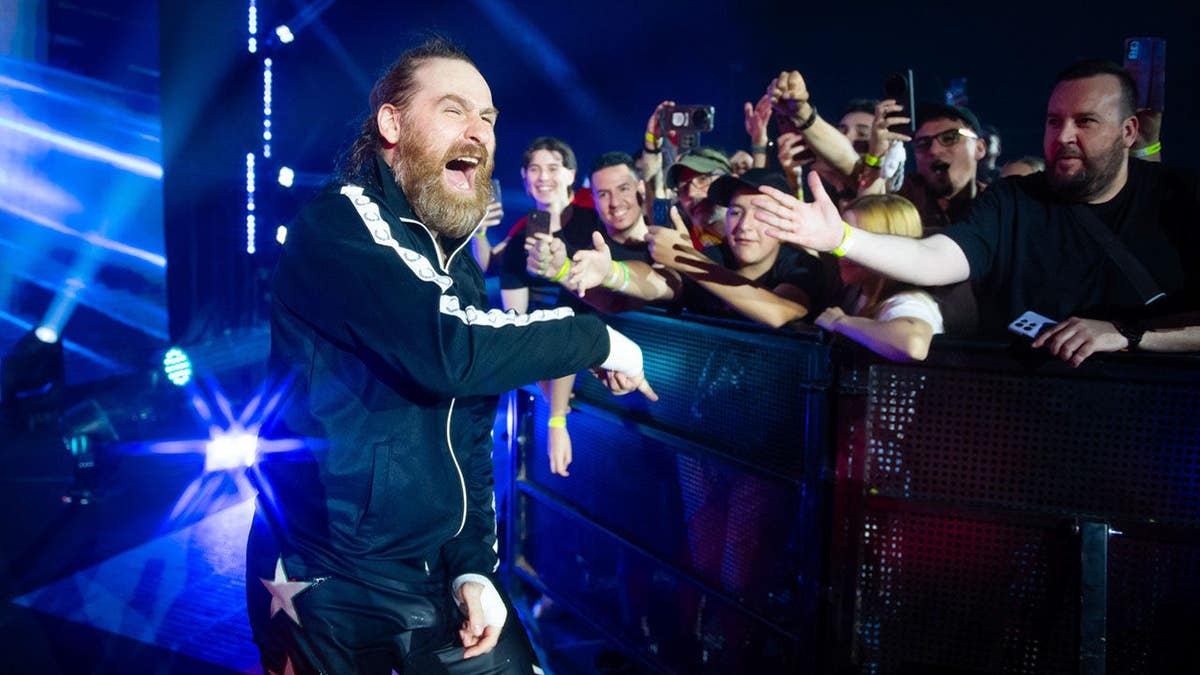 Sami Zayn entering the wrestling ring at a WWE live event in Madrid, Spain.