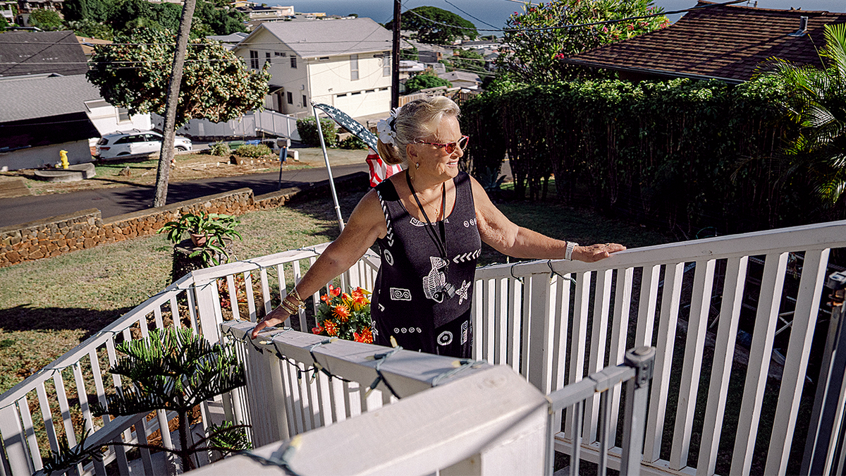 Sandra May on her porch steps