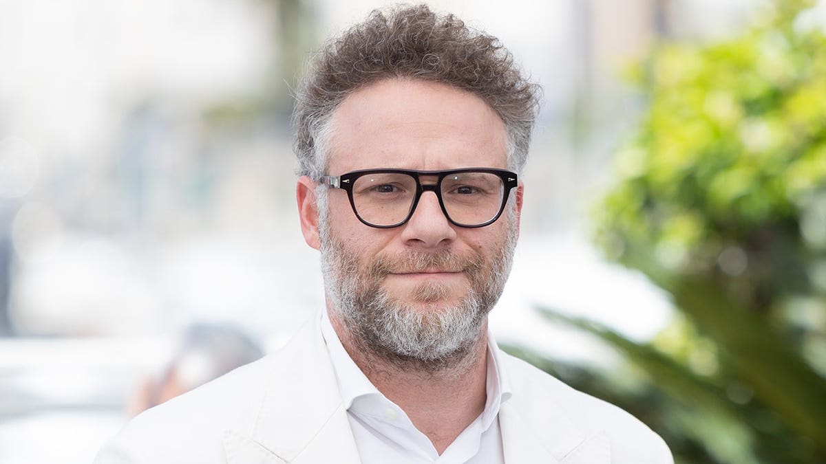 Seth Rogen standing at a photocall for the film Tangles.