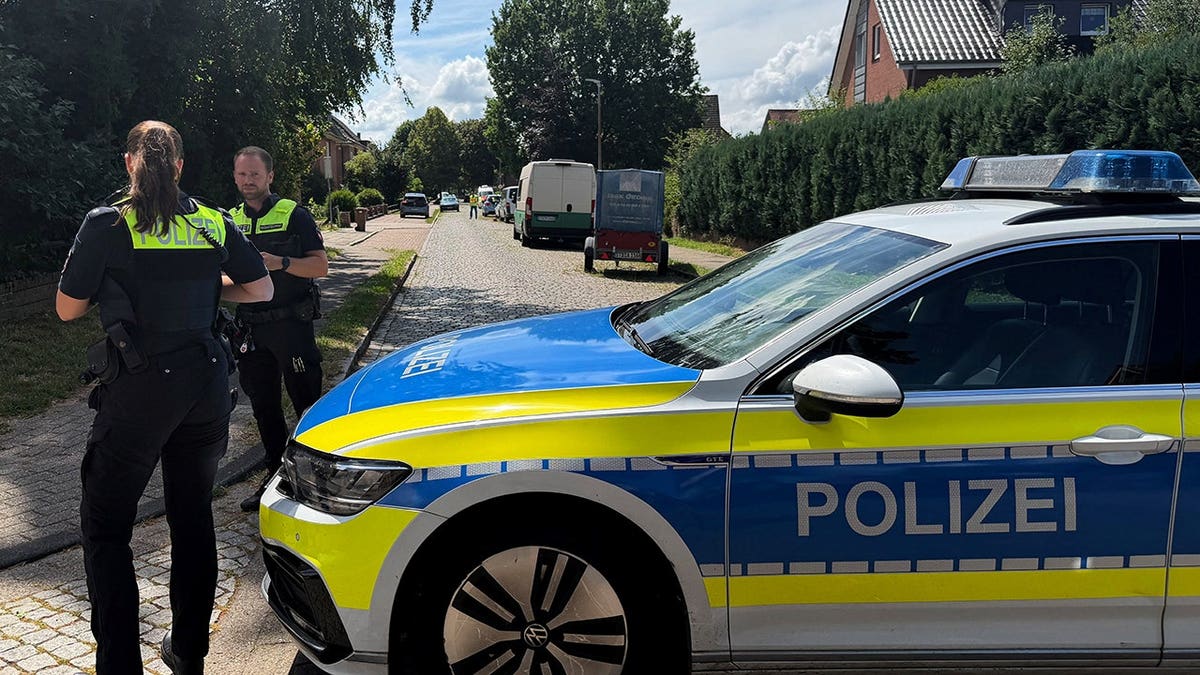 Police officers securing an area in Stade, Germany