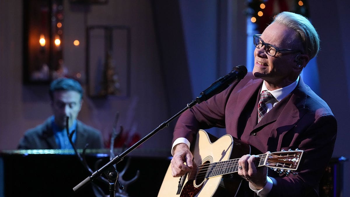 Steven Curtis Chapman singing on stage during CMA Country Christmas special