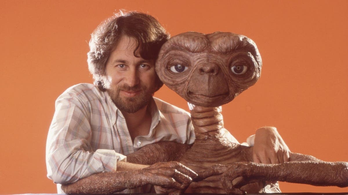 Director Steven Spielberg posing with E.T. at Carlo Rimbaldi studio in Los Angeles