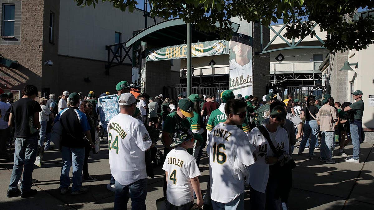 Fans waiting to enter Sutter Health Park before a baseball game in Sacramento, California.