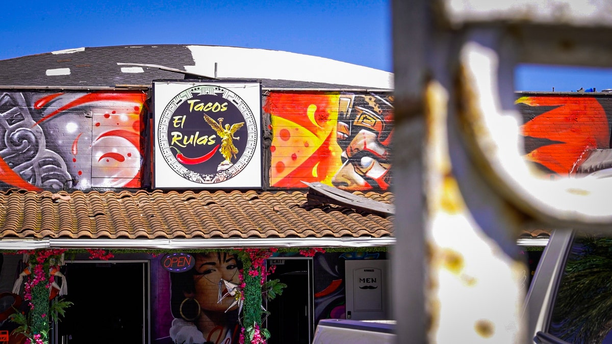 Tacos El Rulas Sign