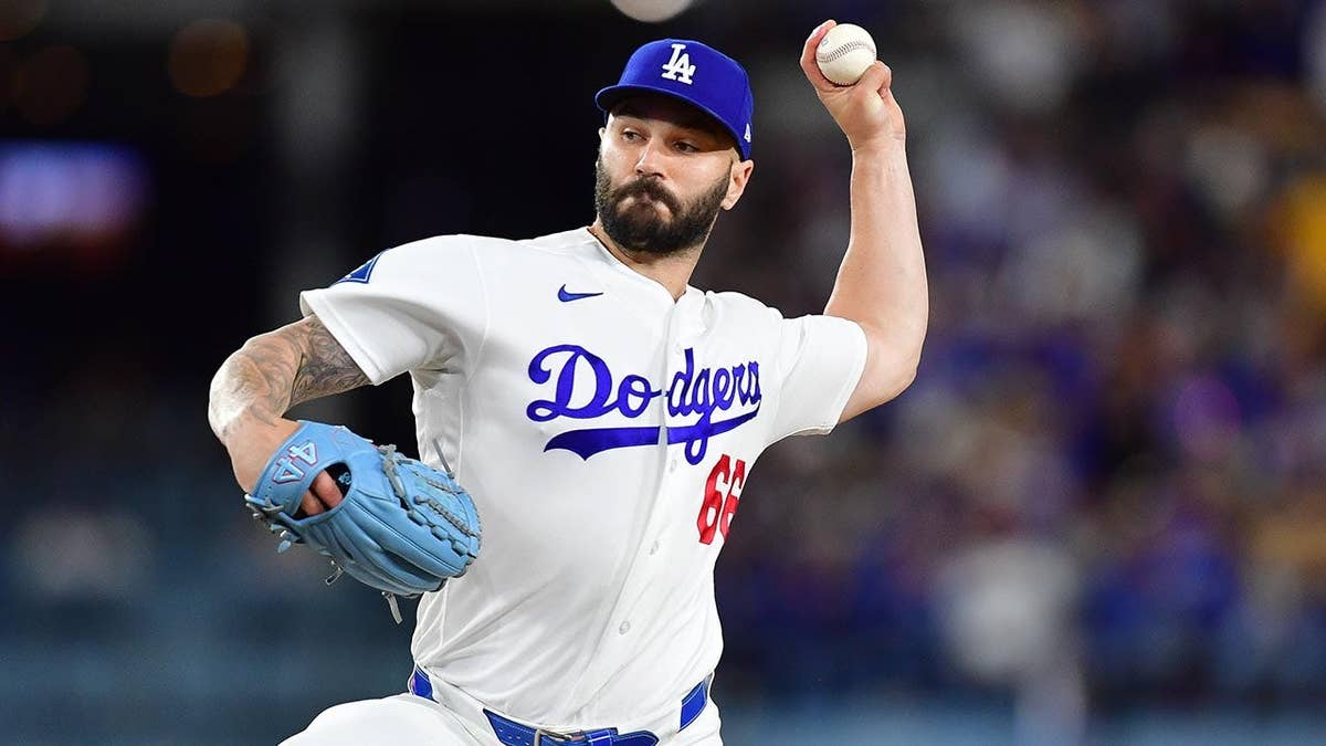 Los Angeles Dodgers pitcher Tanner Scott throwing a pitch at Dodger Stadium