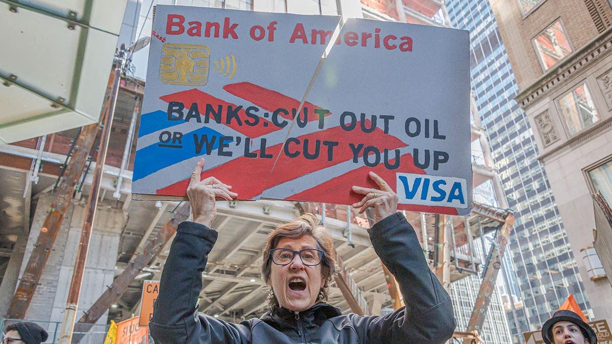 Participant holding a sign at a protest in Manhattan, New York City