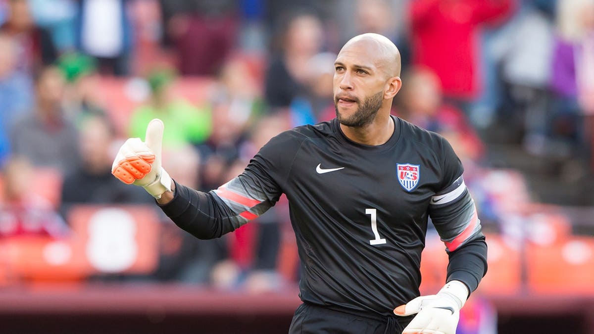 Tim Howard in a United States soccer uniform playing in a game at Candlestick Park