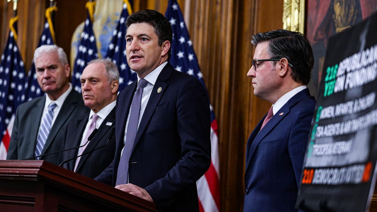 Rep. Tom Emmer, Rep. Steve Scalise, Rep. Bryan Steil, and House Speaker Mike Johnson standing at a news conference at the US Capitol