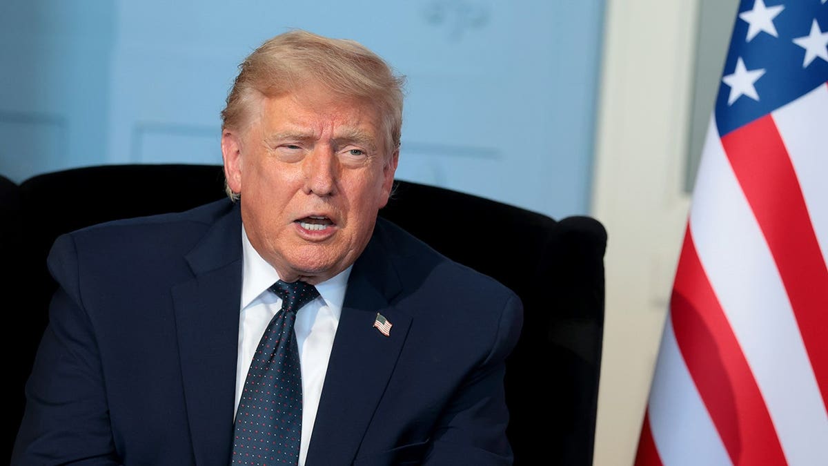 U.S. President Donald Trump talking with French President Emmanuel Macron at Hotel Royal Evian.
