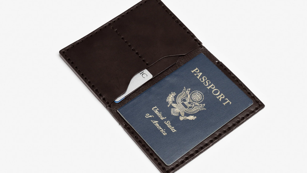 Billykirk hand-stitches, hand-burnishes and edges the passport holder.