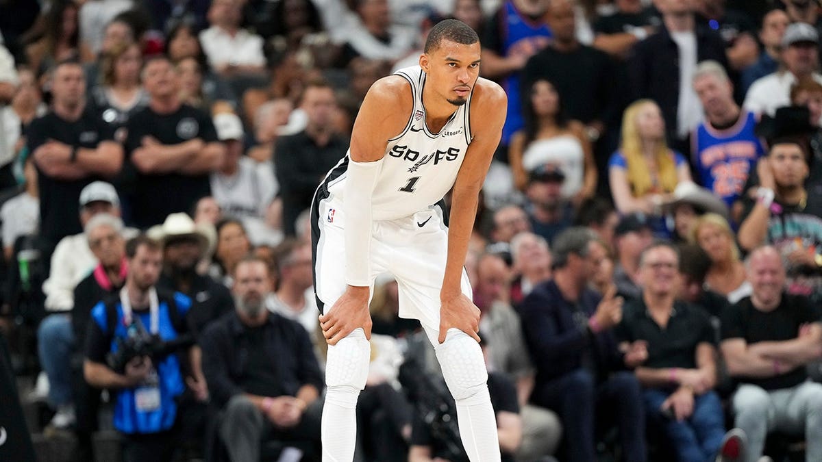 San Antonio Spurs forward Victor Wembanyama looking on during second half of NBA Finals game