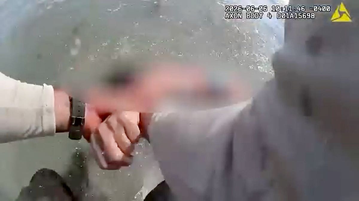 Footage of the rescue of a woman from the ocean in New Smyrna Beach, Florida.