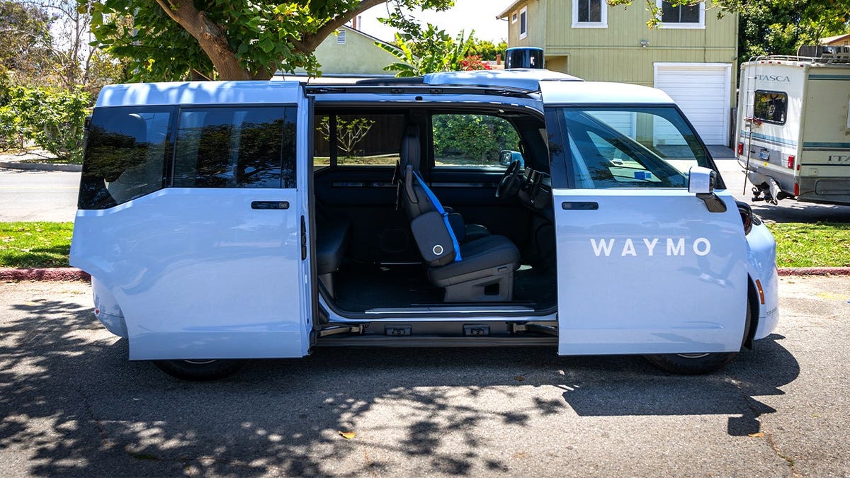 The interior of Waymo's Ojai robotaxi is shown.
