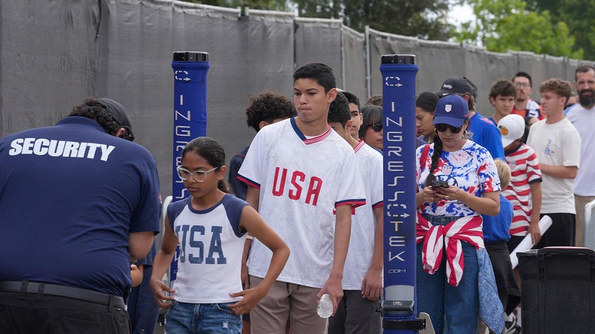 United States fans passing done  information    checks astatine  grooming  venue successful  Irvine, California