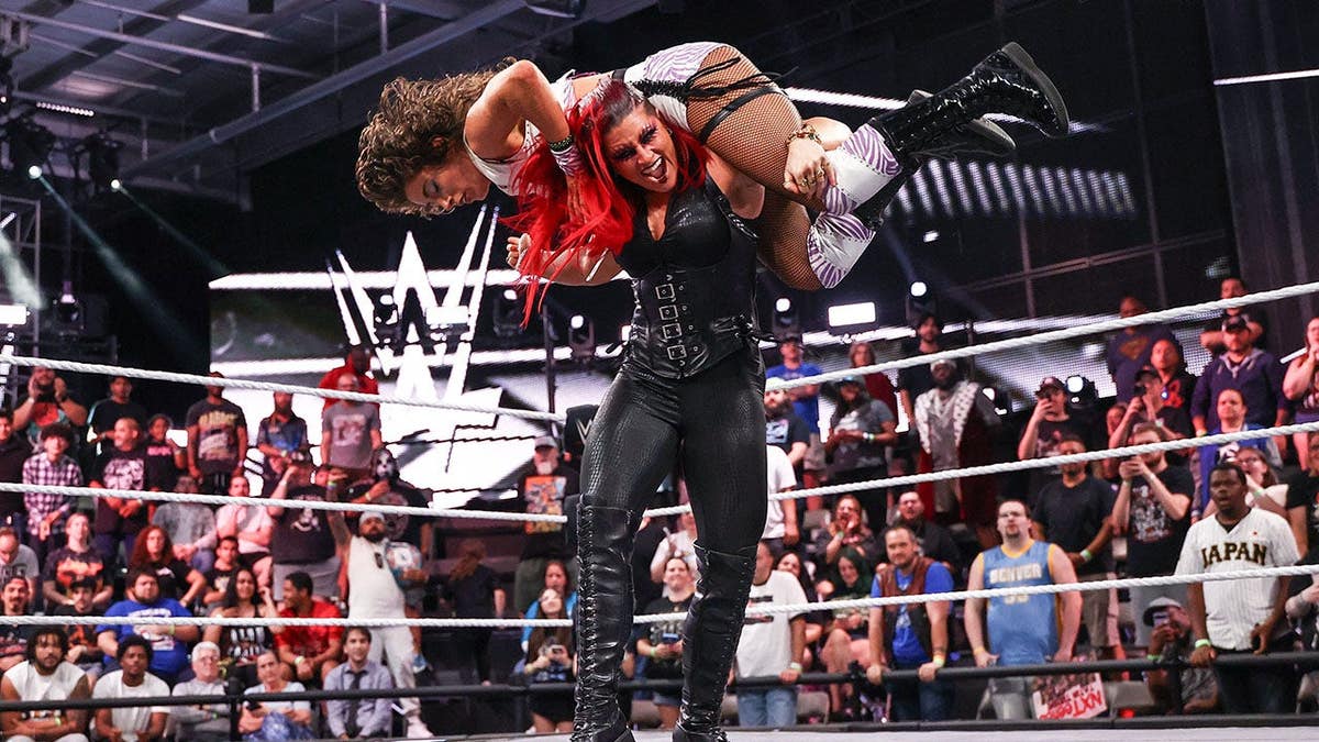 Zaria attacking Lizzy Rain during NXT lucifer astatine WWE Performance Center successful Orlando Florida