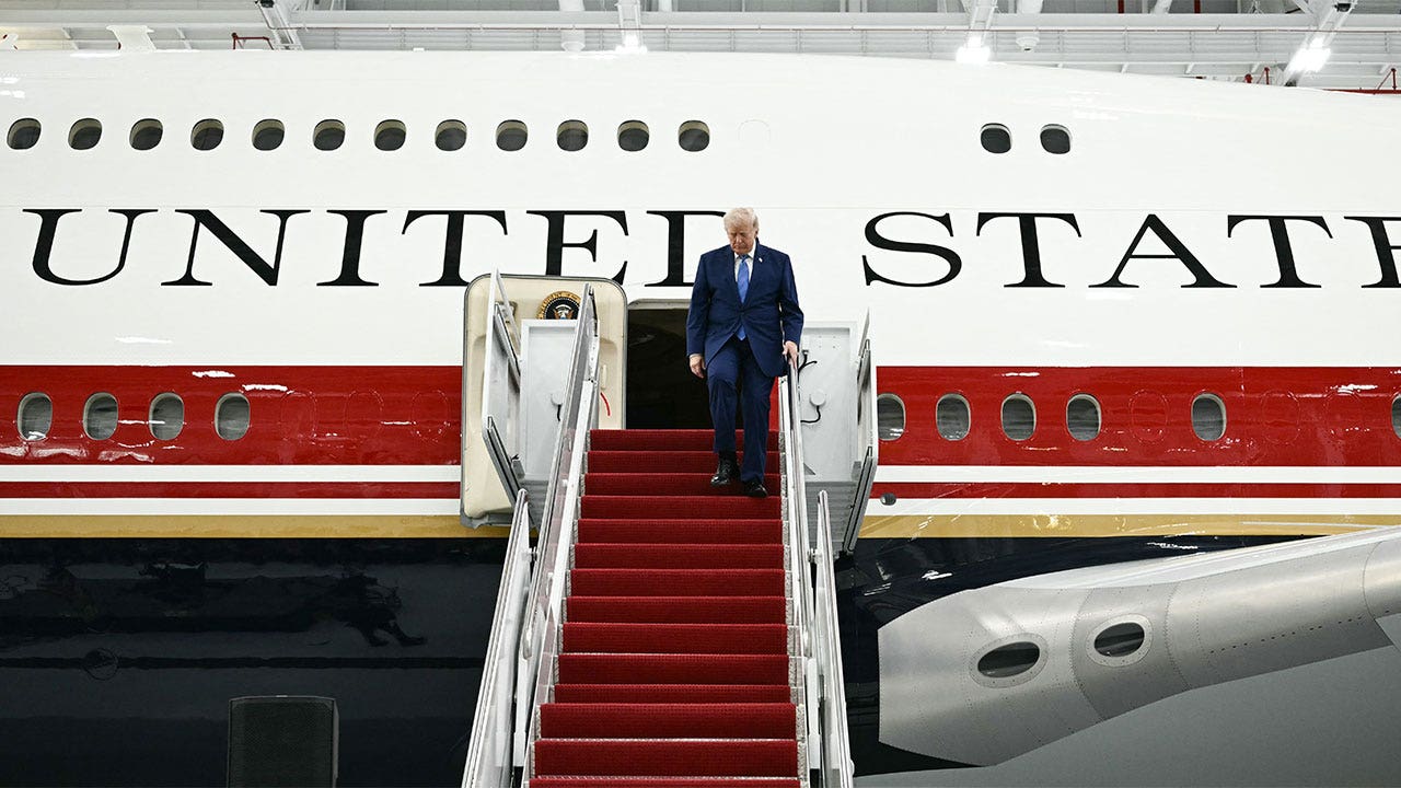Trump unveils revamped Air Force One with new patriotic paint