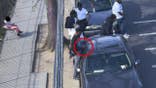 Alleged drug dealers in Washington D.C., making a sale.
