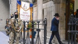 Armed guards outside synagogue in Belgium.