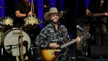 Chris Janson performing onstage in Nashville, Tennessee.