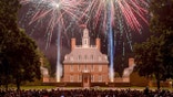 Fireworks explode behind the Governor's Palace in Williamsburg