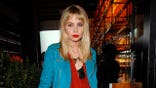 Daveigh Chase wears blue coat