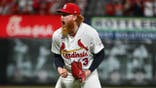Dustin May pitching for St. Louis Cardinals at Busch Stadium.