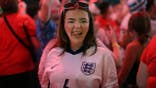Fans celebrating victory at BOXPARK Wembley in London after FIFA World Cup match.